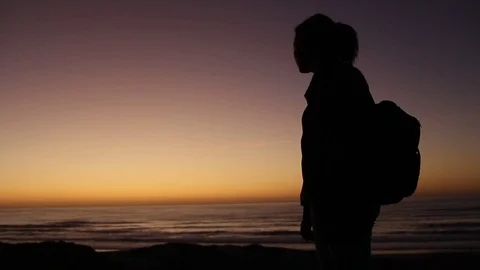 Backpacker with ponytail silhouette Stock Footage 123143504