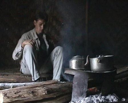 Backpacker preparing tea Stock Footage 378392