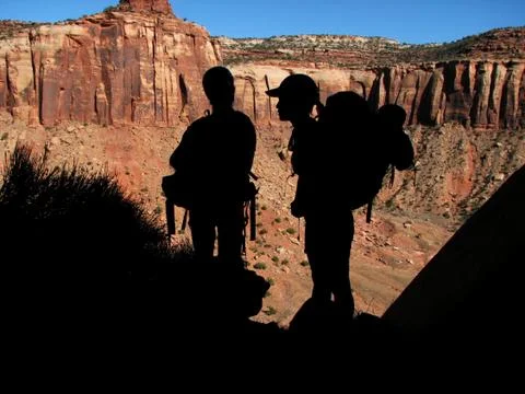 Backpacker silhouettes Stock Photos