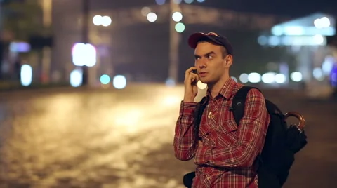 Backpacker Speaks by Phone 스톡 동영상 40044492