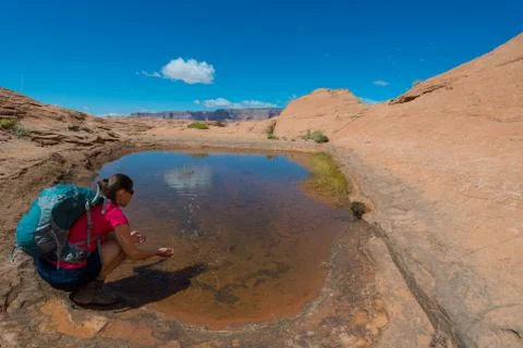 Backpacker splashing water, Stock Photos