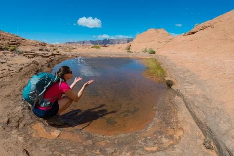 Backpacker splashing water, Stock Photos