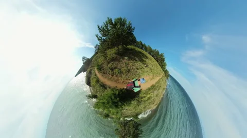 Backpacker Strolling Along a Scenic Great Baikal Trail on a Miniature Planet. Stock-Footage 288574813