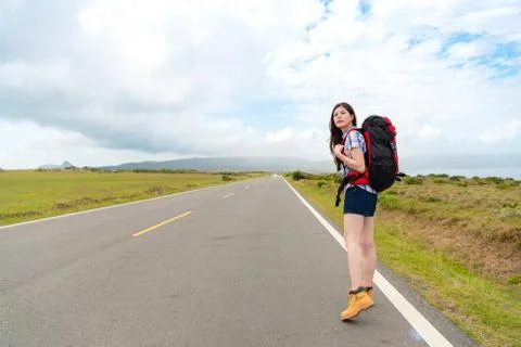 Backpacker turn around looking for right route 스톡 사진