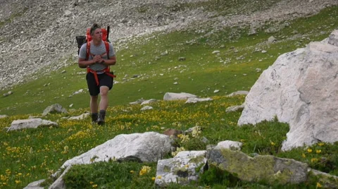 Backpacker walking in the mountains Stock-Footage 43249069