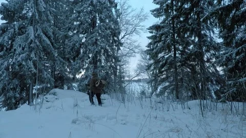 Backpacker walking in a nordic blue daylight Stock Footage 146729030