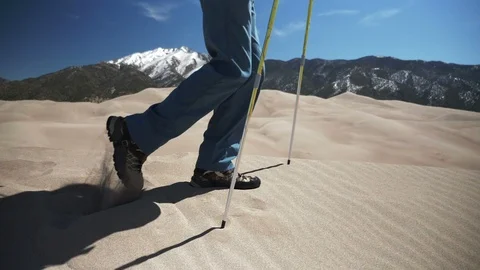 Backpacker Walking Ridge Line in Sand Dunes National Park Stock Footage 106071980