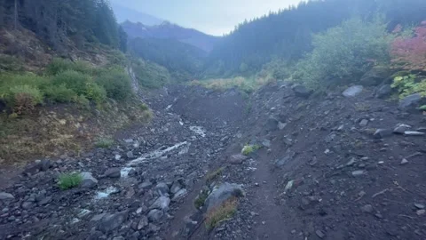 Backpacking Mount Jefferson Wilderness: glacier stream crossing Stock Footage 329457725