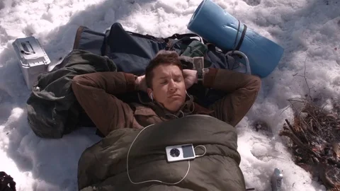 Backpacking Snowy Soldier Waking up at camp Stock Footage 83564328