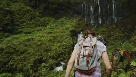 Backpacking Towards Waterfall Stock Footage 75281709