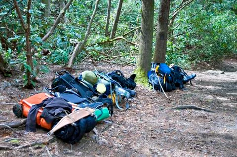 Backpacks on the Ground Stock Photos
