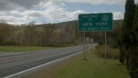 Backroads Welcome to NY State Line Road Trip in Autumn Stock Footage 97388241