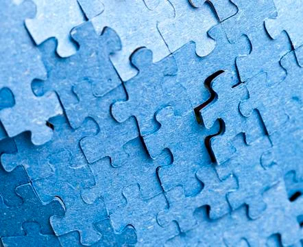 Backside of blue puzzle jigsaw Stock Photos