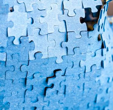 Backside of blue puzzle jigsaw Photos
