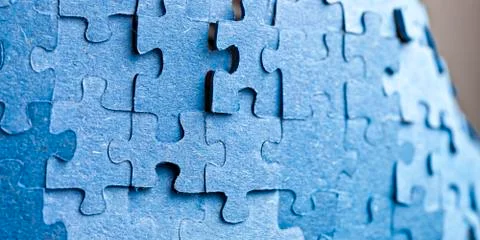 Backside of blue puzzle jigsaw Stock Photos