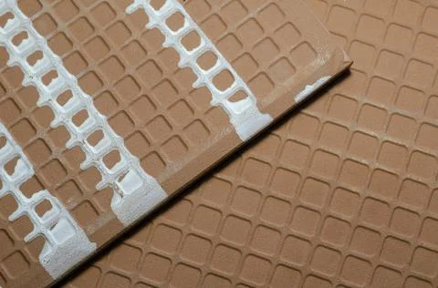 Backside of ceramic tiles with white engobe paste. Stock Photos