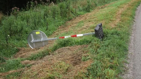 Backside of circular sign with red and white caution metal post on plastic Video stock 252053020