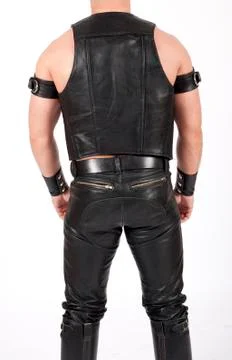 Backside of a fetish leatherman 스톡 사진