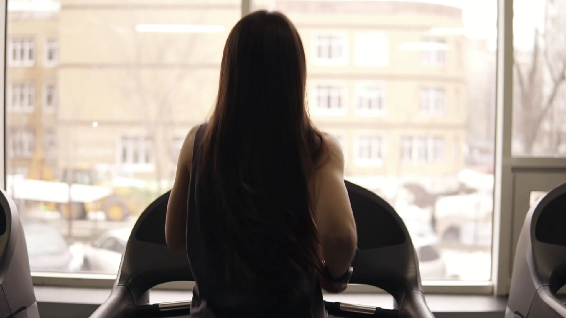 Backside Footage From Top Downward Of A Sportive Girl With Long