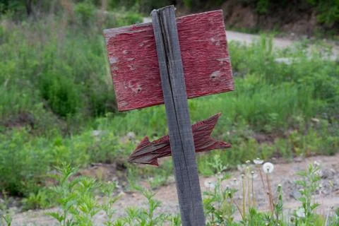 Backside of the old sign standing outside Stock Photos