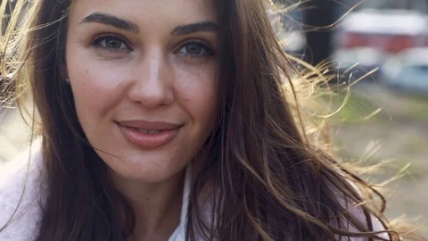 Backside Tracking Footage of Beautiful Young Girl Walking Down the Street Turnin Stock Footage 123651953