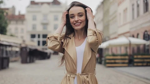 Backside Tracking Footage of Pretty Young Lady Walking Jumping Happily the Stock Footage 114415907