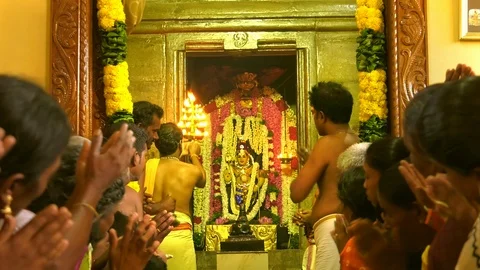 Backside view close up Hindu people praying at hinduism temple Stock Footage 121138503
