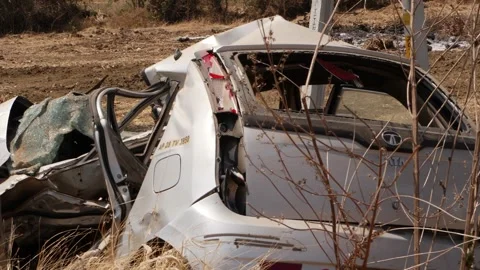 Backside view of white car crashed, Crashed car footage Stock-Footage 151835817