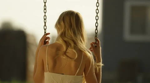 Backside of a Woman on a Swing Stock Footage 67299717