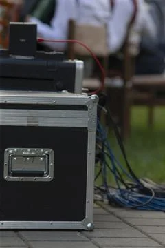 Backstage audio connections with visible cables during event setup Stock Photos