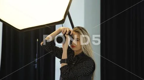 Backstage fashion photographer work art profession Stock Photos
