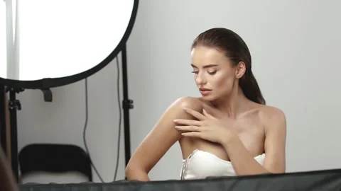 Backstage of gorgeous woman posing in studio Stock Footage 146234699