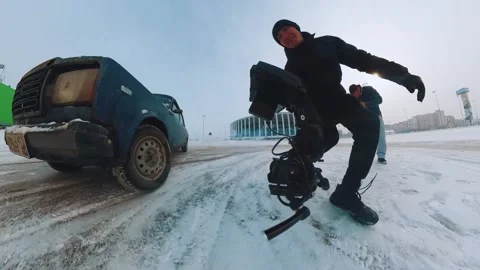 Backstage operator shooting in winter, videographer working in winter Stock Footage 238005233