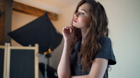 Backstage photoshoot model posing in pyjama slow motion Stock Footage 62198899