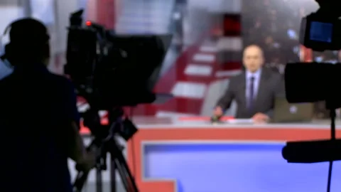 Backstage shooting news in a television studio. News presenter. Stock Footage