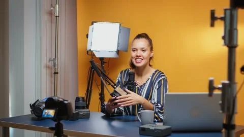 Backstage of vlogger recording a tutorial about fluid heads Stock Photos