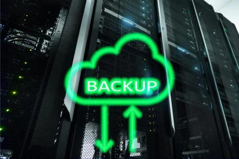 Backup button on modern server room background. Data loss prevention. System  Stock Photos