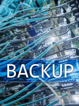 Backup button on modern server room background. Data loss prevention. System  Foto stock