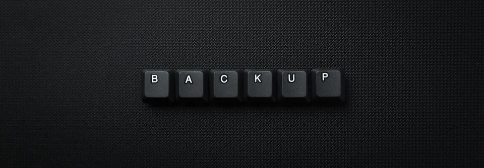 Backup Data Storage Concept With Keyboard Keys On Dark Background Stock Photos