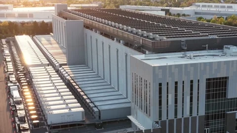 Backup generator enclosures line a data center hall in Ashburn, Virginia Stock Footage 345728268