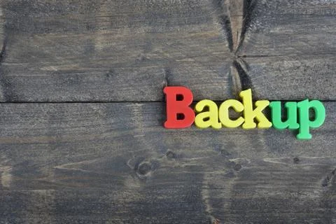 Backup on wooden table Photos
