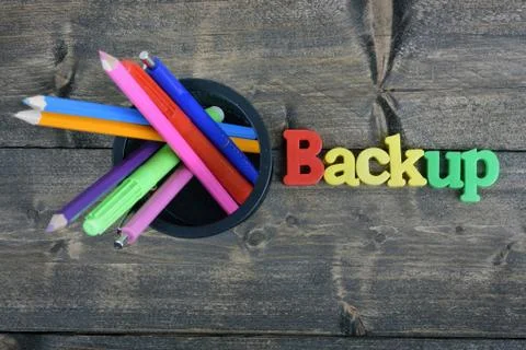 Backup on wooden table Photos