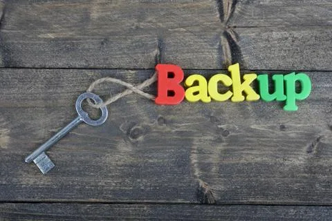 Backup on wooden table Photos