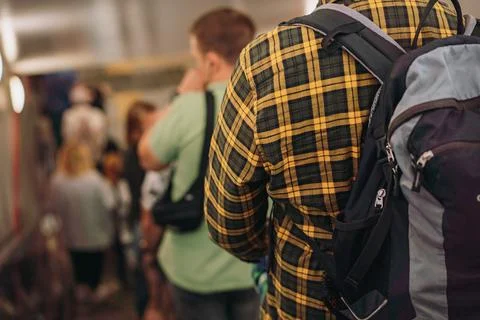 Backview of people going down stairs in underground Stock Photos