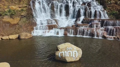 Backward aerial view of Tad Koo waterfall in Bolaven Plateau, Laos Stock Footage 248094761