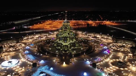 Backward ascending drone shot over festive temple complex Stock Footage 323001156