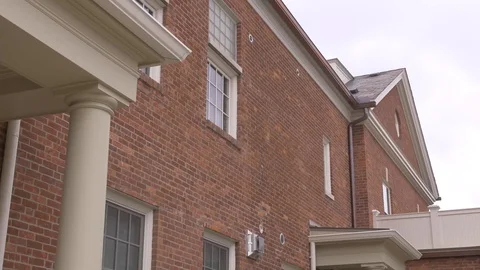 Backward Camera Movement of Brick Building Stock-Footage 100898661