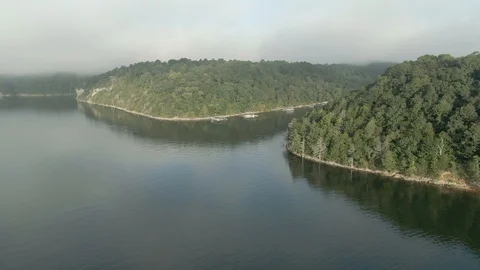 Backward descent upon the lake Stock Footage 115211966