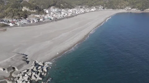 Backward Drone Flight with Diagonal Shoreline and Calm Sea (Part 2) Stock Footage 326179921