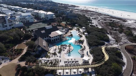 Backward drone fly over the luxury Watersound Beach Club with swimming pools in Видео 331067070